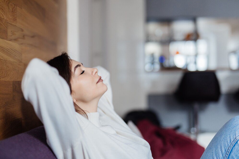 Charming is dreaming on sofa at home after classes<br />
